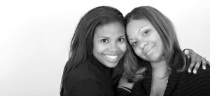 Women leaning on each other