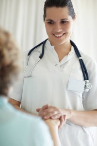 Nurse comforting patient